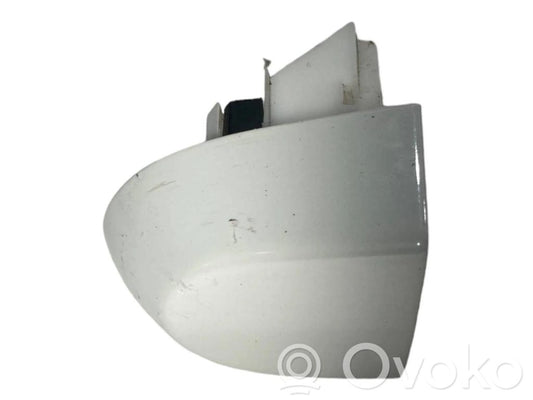 Priekšpusē durvju roktura vāciņš