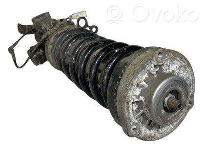 Front shock absorber with spring