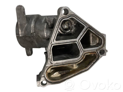 Oil filter holder/cooler
