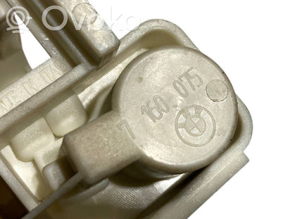 Aizmugures spuldzes vāka turētājs