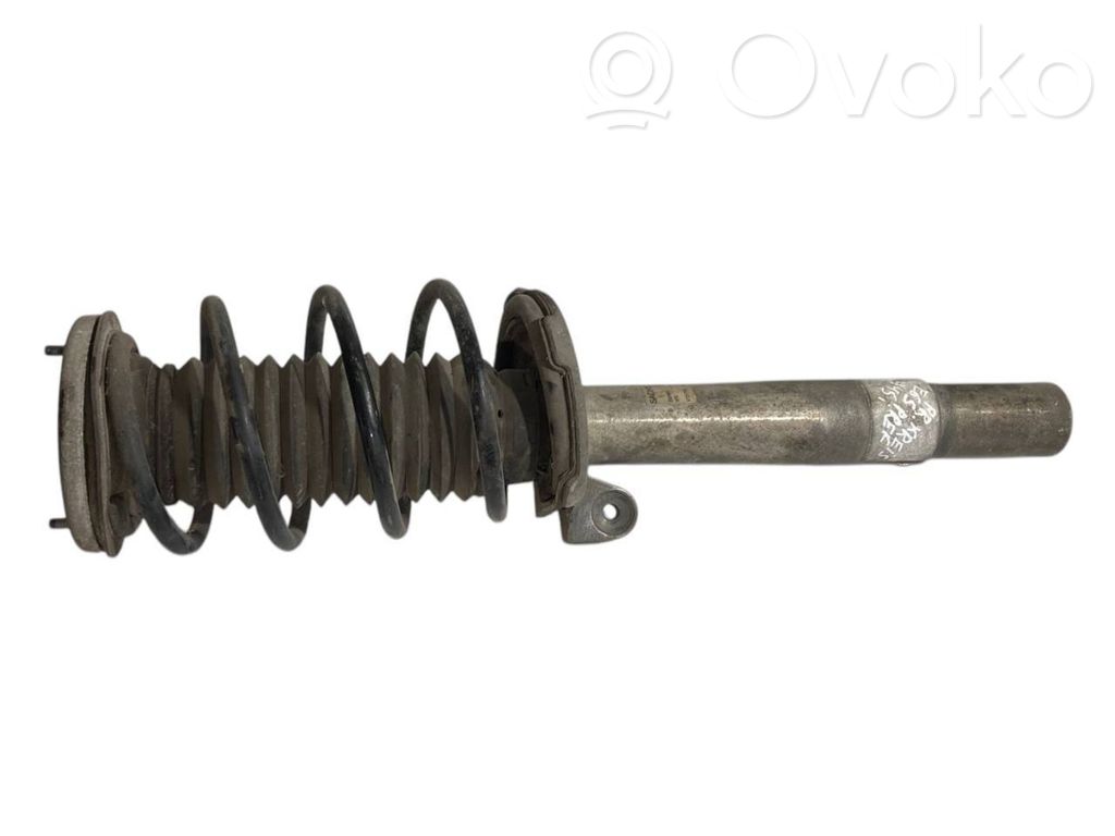 Front shock absorber with spring