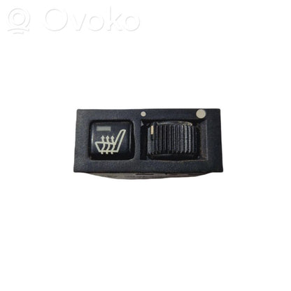 Sēdekļu apsildes slēdzis