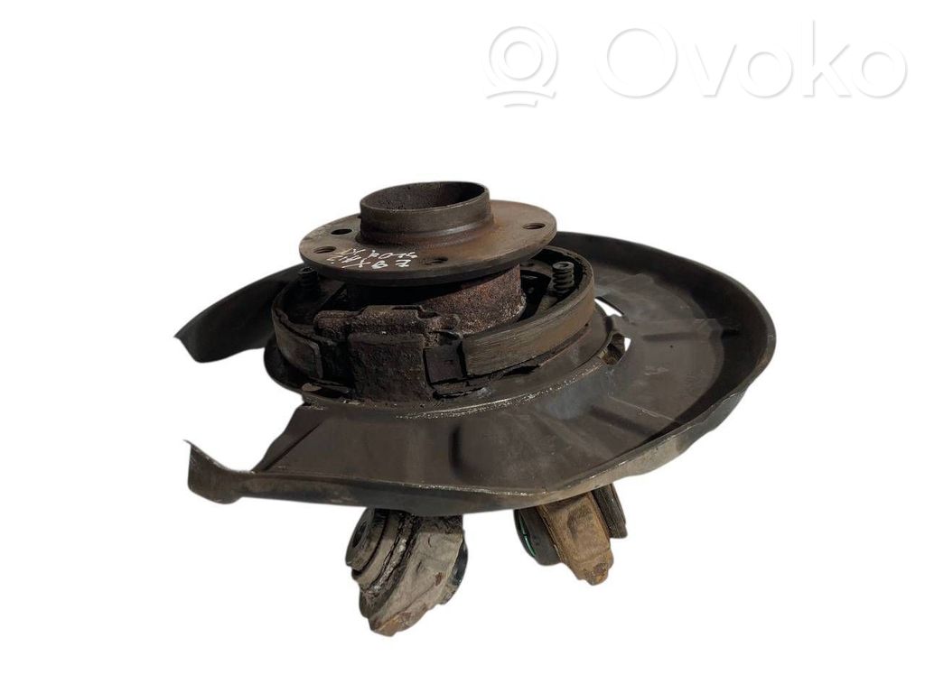 Aizmugurē riteņa rumbas vārpstas šarnīrs (stupica, capfa)