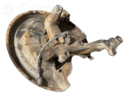 Aizmugurē riteņa rumbas vārpstas šarnīrs (stupica, capfa)