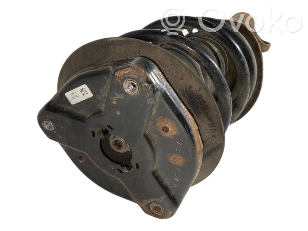 Priekšpusē amortizators ar atsperi