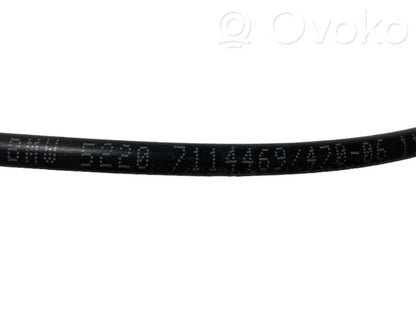 Handle for folding the seat backrest