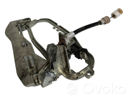 Holder/bracket for external opening handle at the front