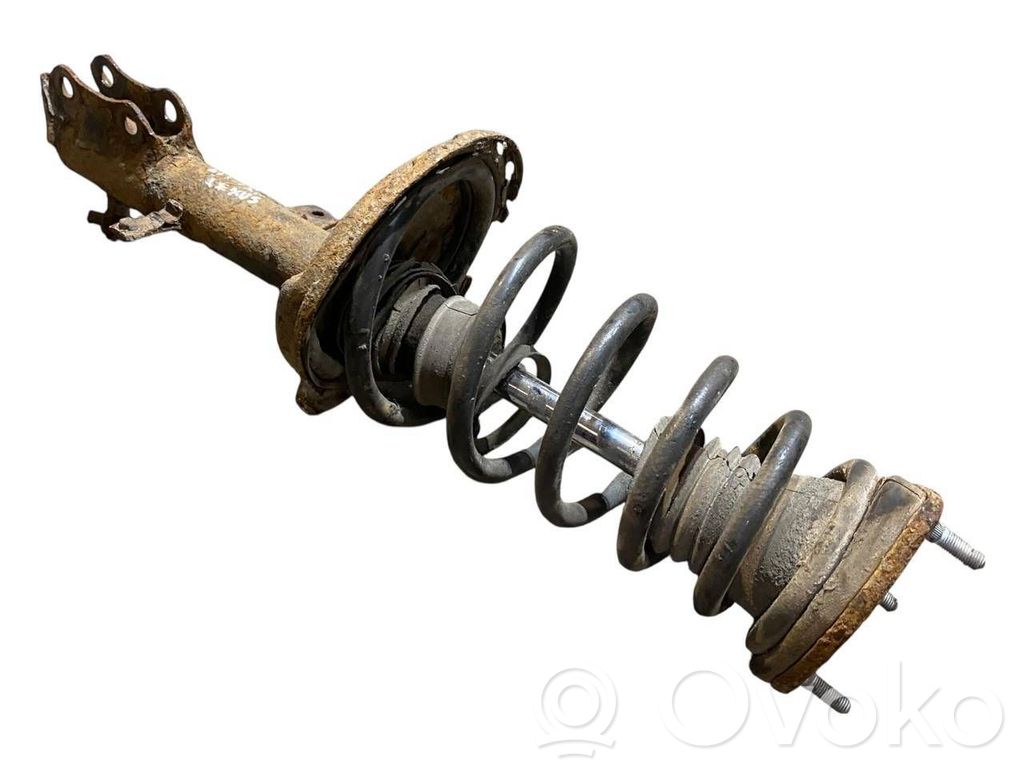 Aizmugurē amortizators ar atsperi