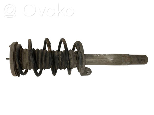 Priekšpusē amortizators ar atsperi