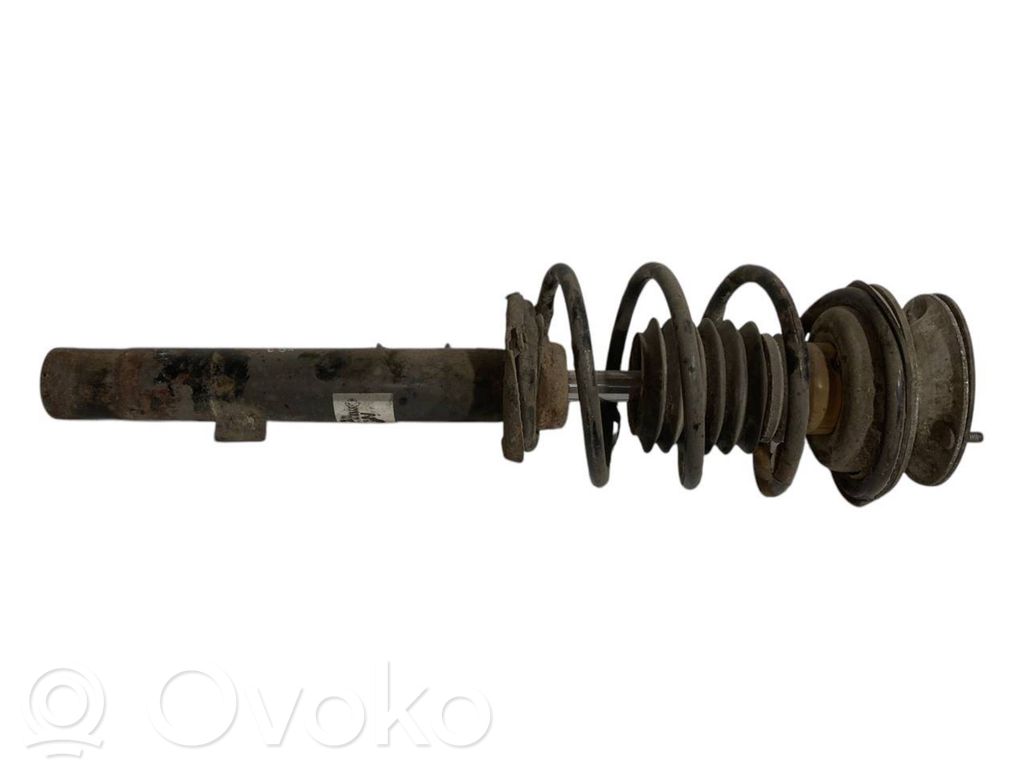 Priekšpusē amortizators ar atsperi