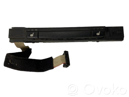 Seat heating switch