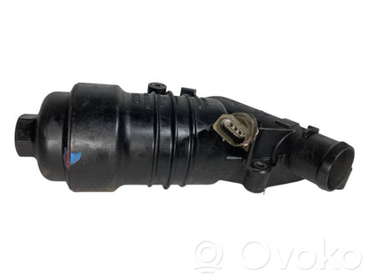 Oil filter holder/cooler