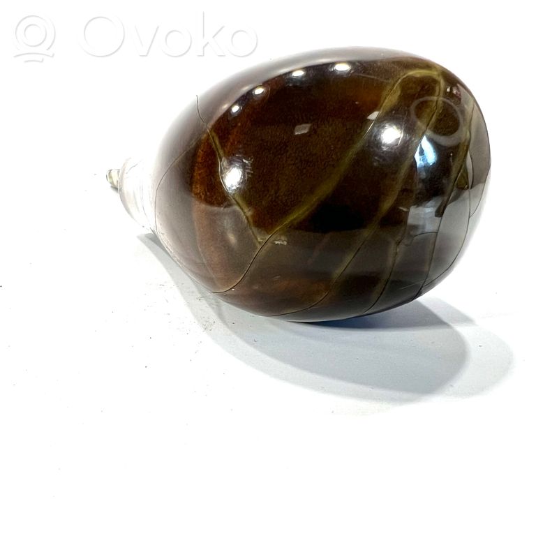 Ātrumu pārslēgšanas sviras dekoratīvā apdare (āda, uzgalis)