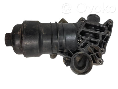 Oil filter holder/cooler