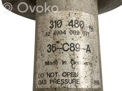 Front shock absorber with spring