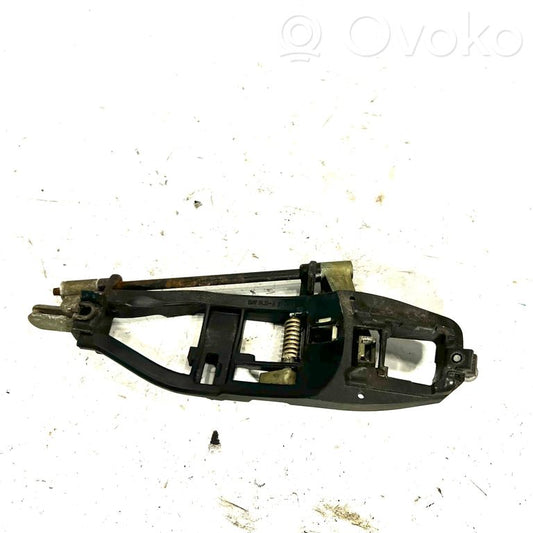 Holder/bracket for external opening handle at the front
