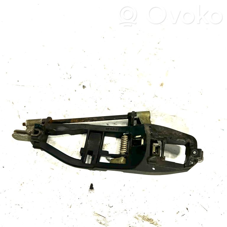 Держатель/кронштейн для внешней ручки открывания спереди