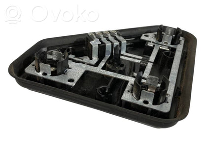 Aizmugures spuldzes vāka turētājs