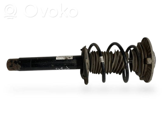 Front shock absorber with spring