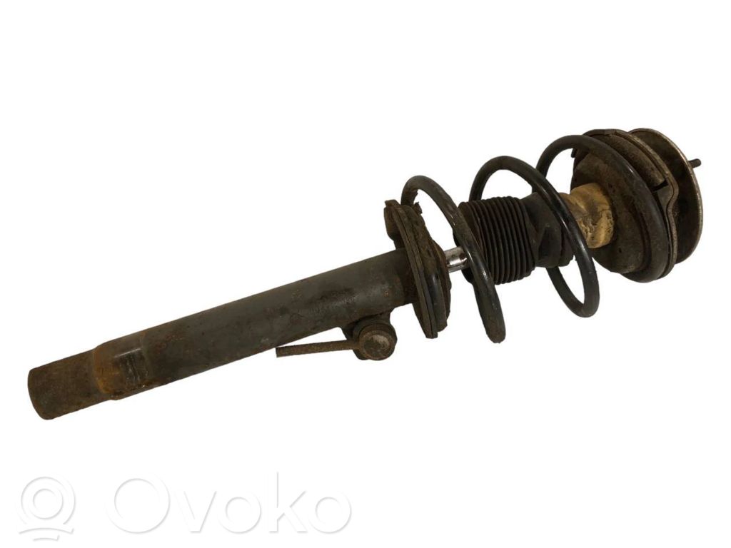 Priekšpusē amortizators ar atsperi