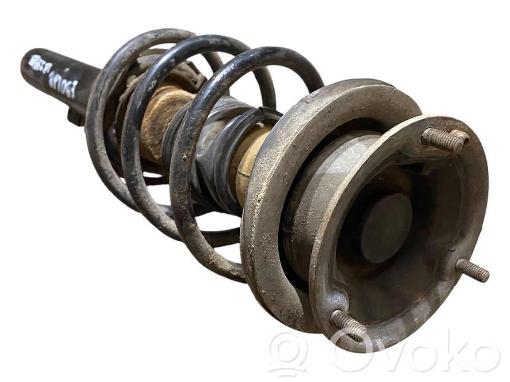 Priekšpusē amortizators ar atsperi