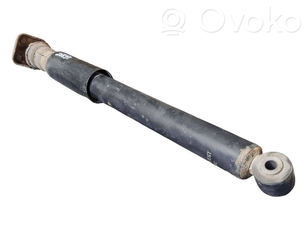 Aizmugurē amortizators ar atsperi