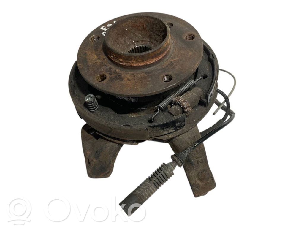 Aizmugurē riteņa rumbas vārpstas šarnīrs (stupica, capfa)