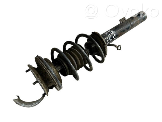 Priekšpusē amortizators ar atsperi