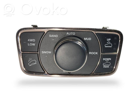 Šasijas aukstuma / stingruma regulēšanas slēdzis