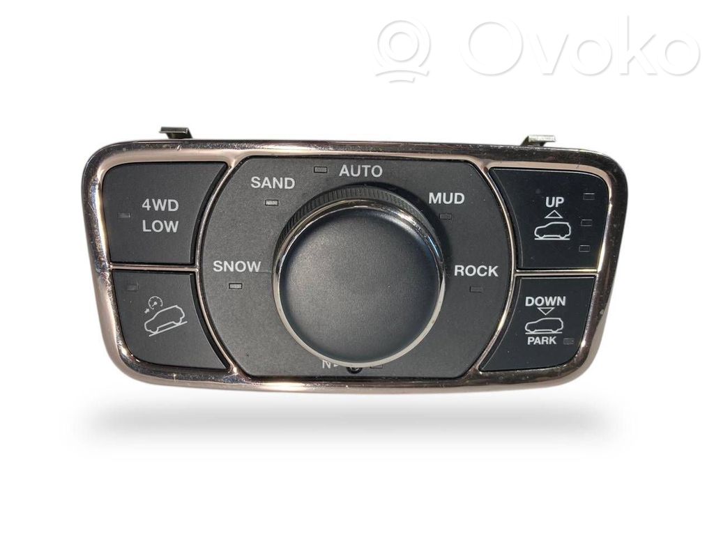 Šasijas aukstuma / stingruma regulēšanas slēdzis