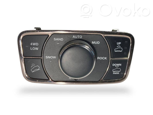 Šasijas aukstuma / stingruma regulēšanas slēdzis