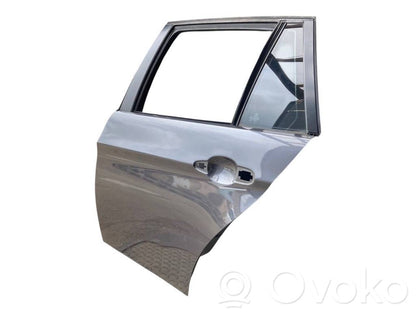 Aizmugurējās durvis