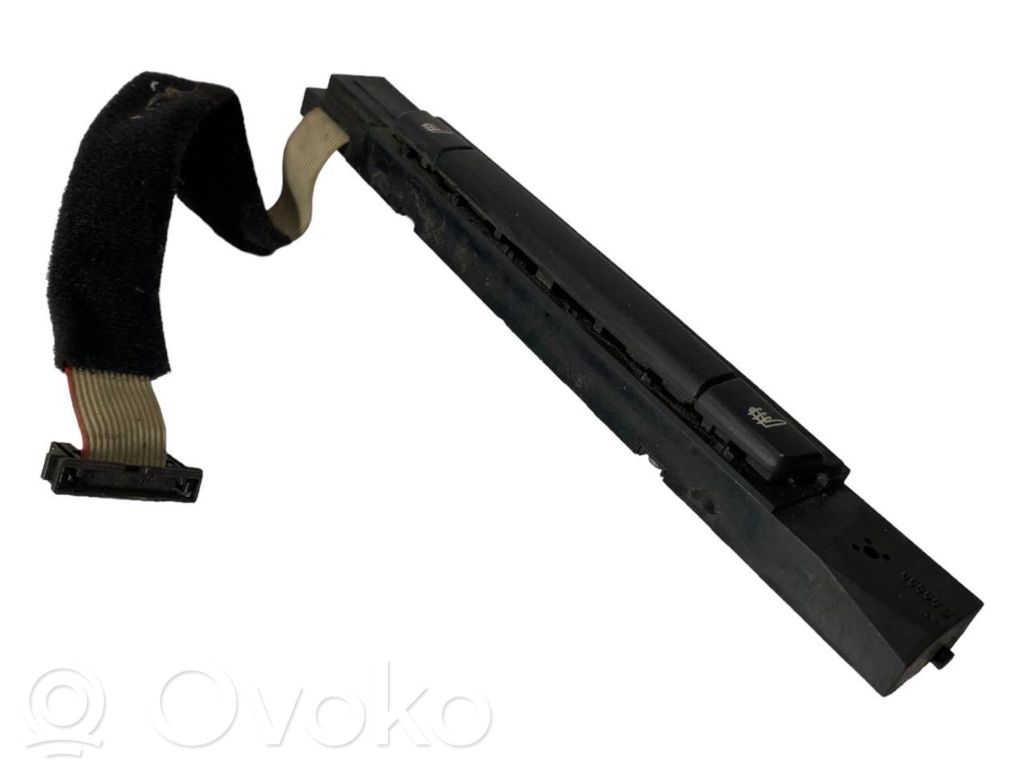 Sēdekļu apsildes slēdzis