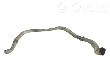 Window fluid reservoir filler pipe